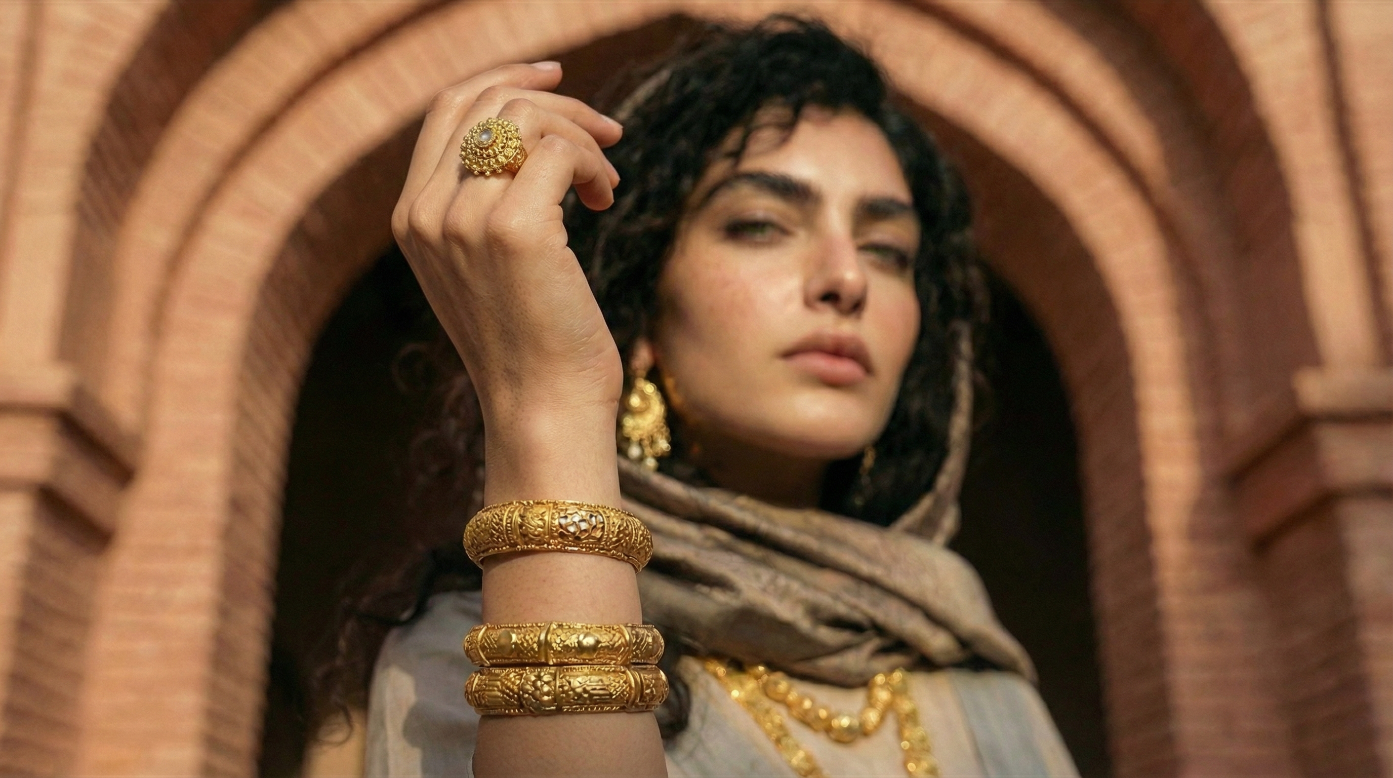 Close-up portrait with gold tassel earring — Gulf Heritage editorial