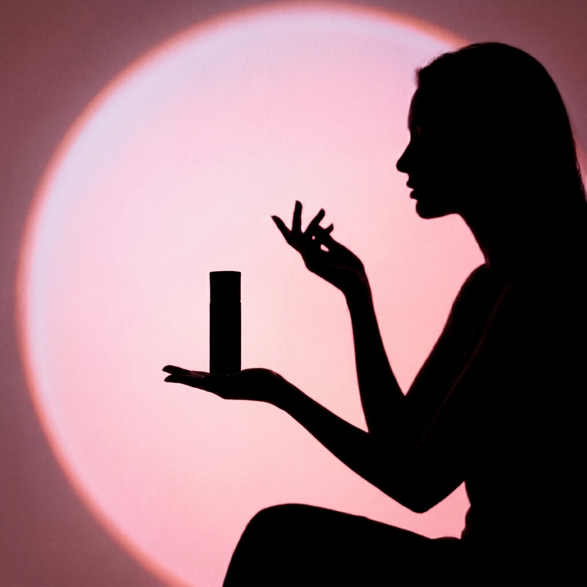 ASSAF Arrogate Pink Diva — editorial portrait, model with perfume bottle